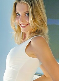 Blonde hottie is a sexy white dress